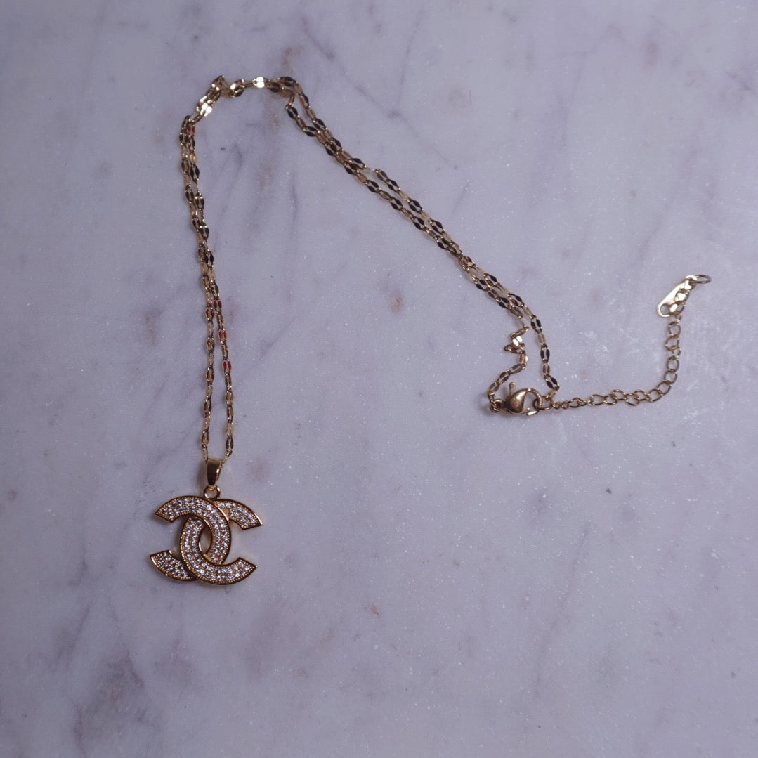 Cs gold twist necklace