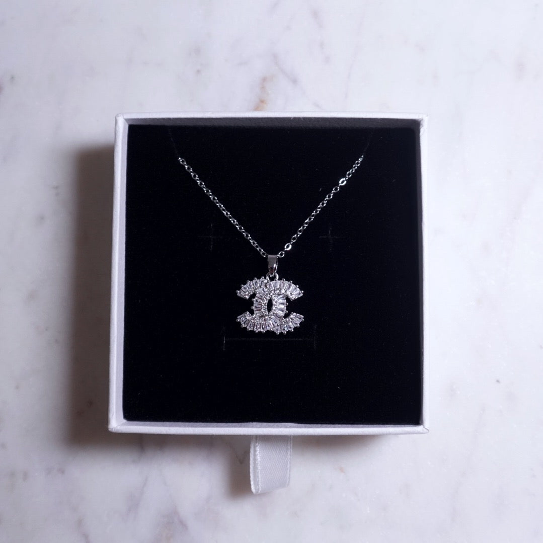 Cs twist necklace